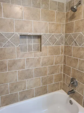 a bathroom with a bathtub