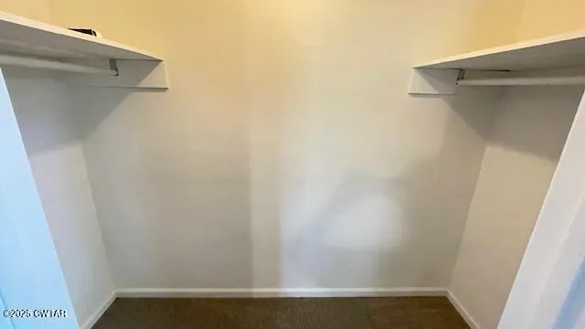 a view of house with backyard