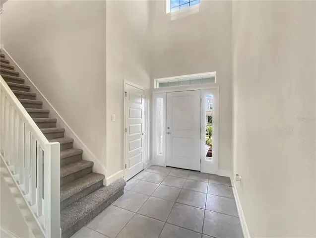 a view of a kitchen with a sink and a window