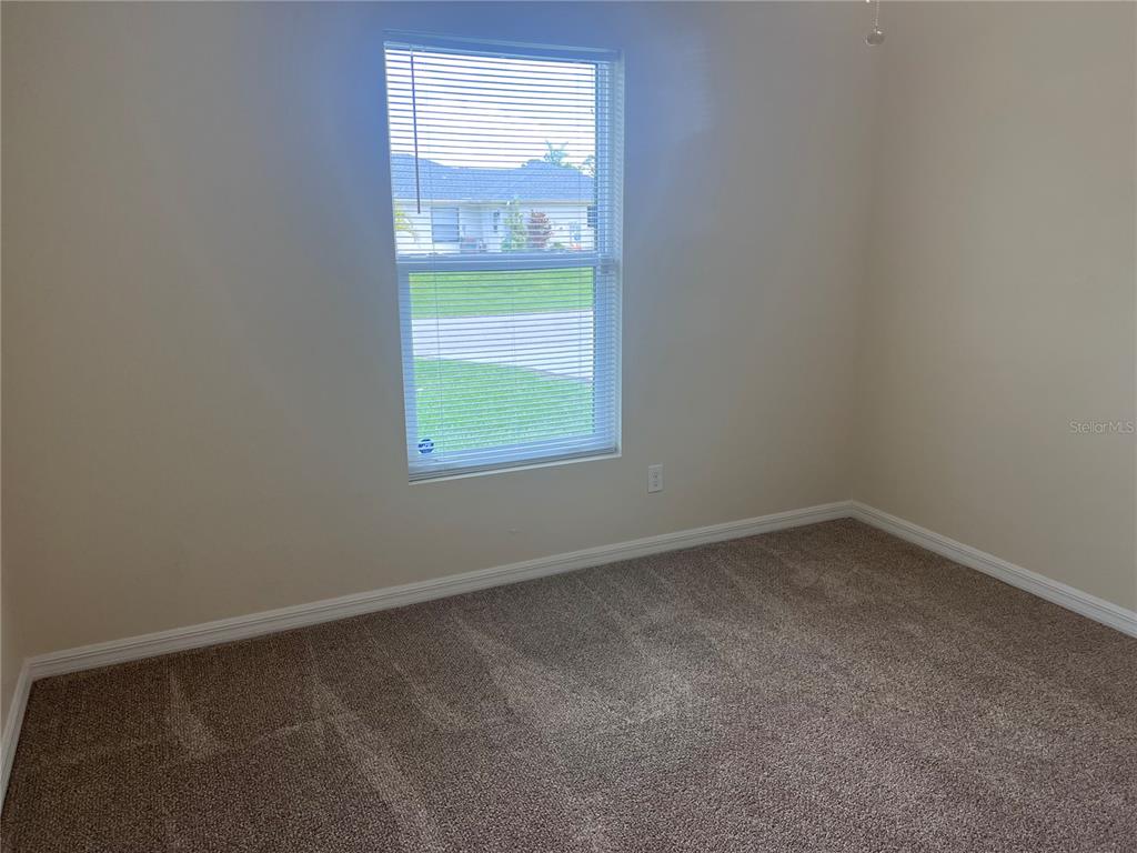 26513 Glaspell Road Punta Gorda, FL 33955 - Photo 19 of 31 Guest Bedroom