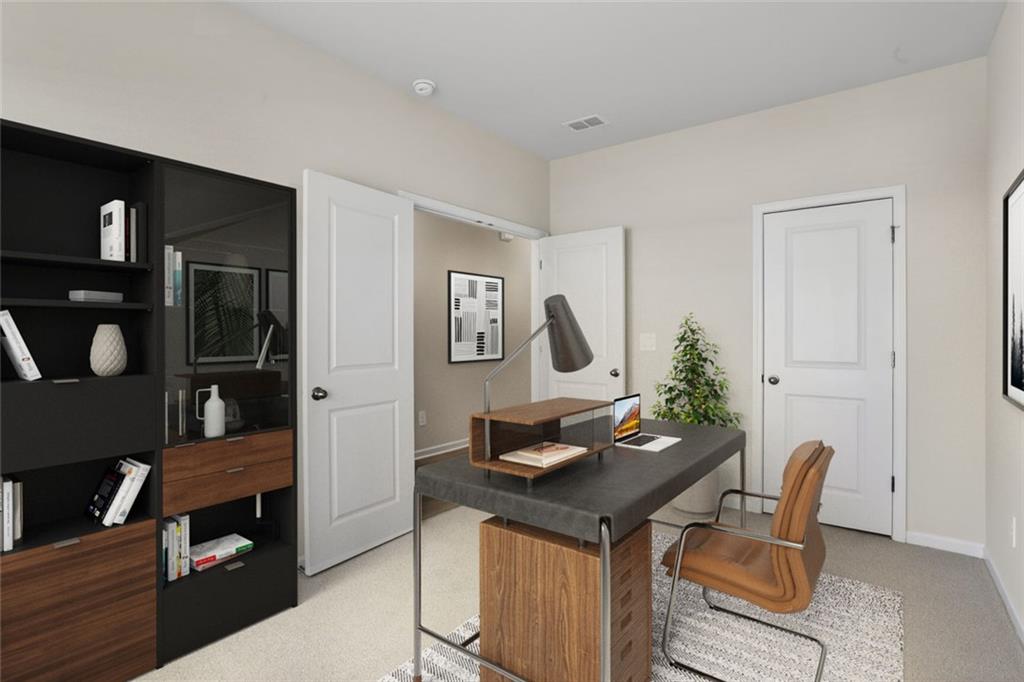 6929 Winchester Place Fairburn, GA 30213 - Photo 3 of 35 a view of a workspace with furniture