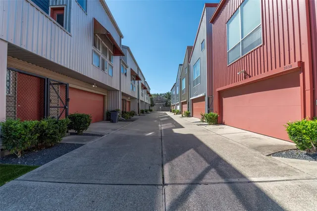 a city street lined with tall buildings