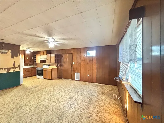 a bathroom with a sink vanity and a mirror