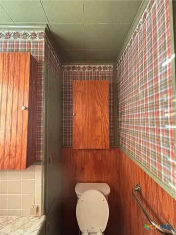 a view of a big room with table and chairs