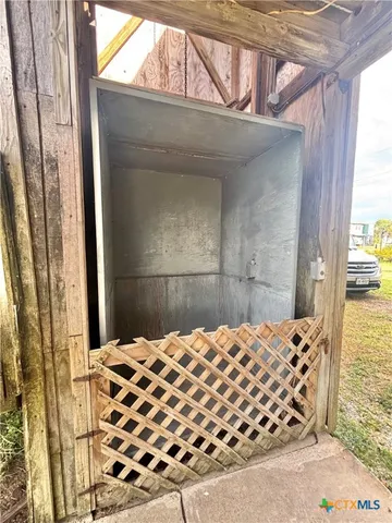 a bathroom with a sink vanity and a mirror
