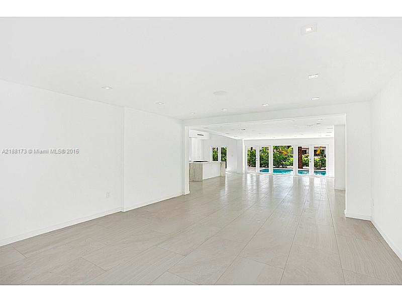 1760 Cleveland Road Miami Beach, FL 33141 - Photo 5 of 14 a view of an empty room with wooden floor