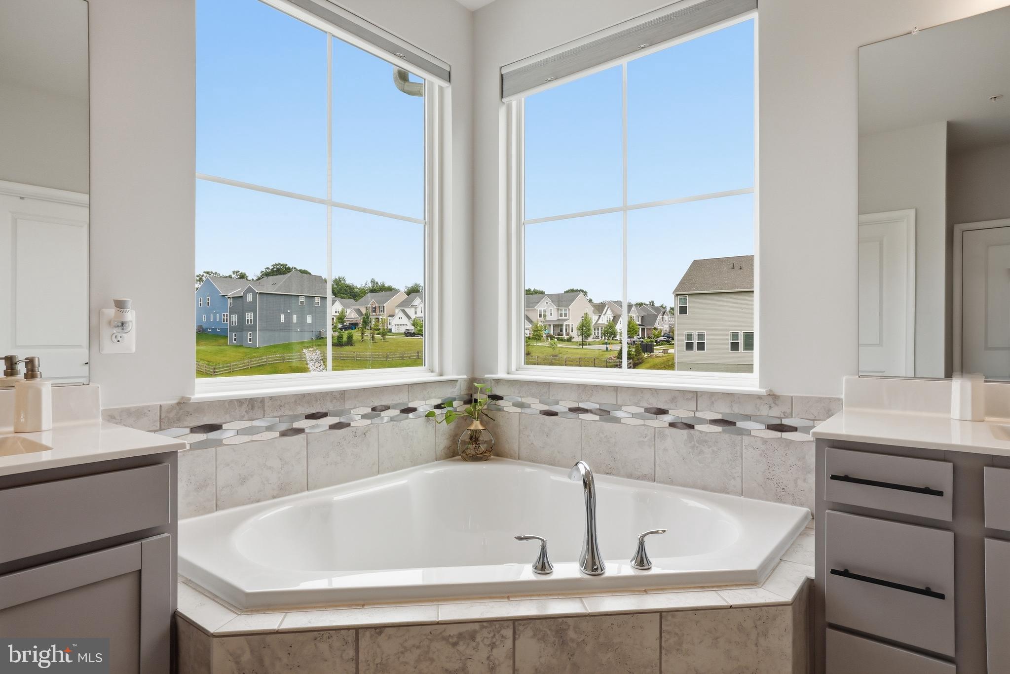 5707 Hawk Ridge Road Frederick, MD 21704 - Photo 45 of 109 a bathroom with a bathtub and a sink
