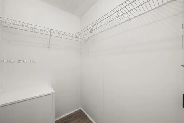 a view of a room with racks on the wall