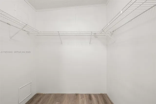 a view of a room with racks on the wall