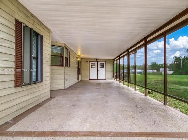 a view of porch with large windows