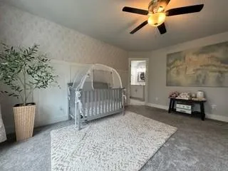 a view of livingroom with furniture and a ceiling fan