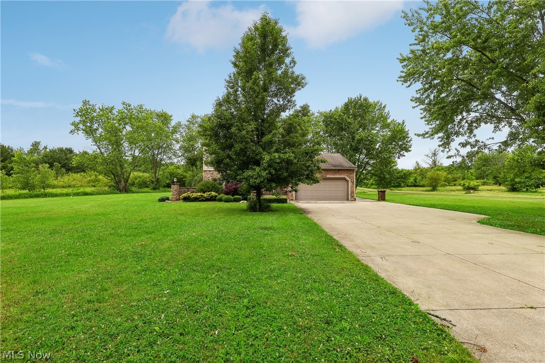 4702 Alger Road Richfield, OH 44286 - Photo 42 of 46 View of the front of property with large front yard and a long concrete driveway