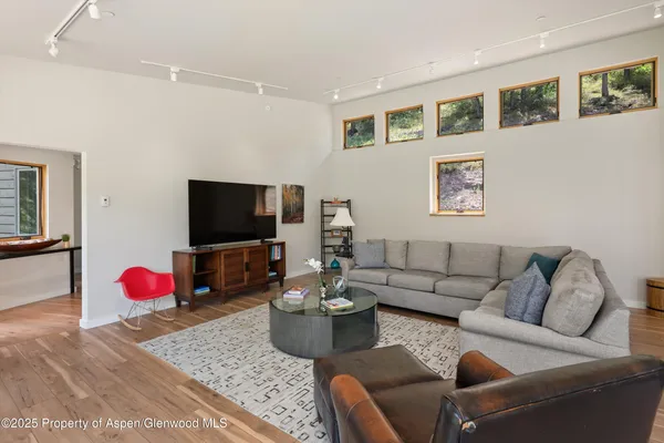 a view of a balcony with furniture