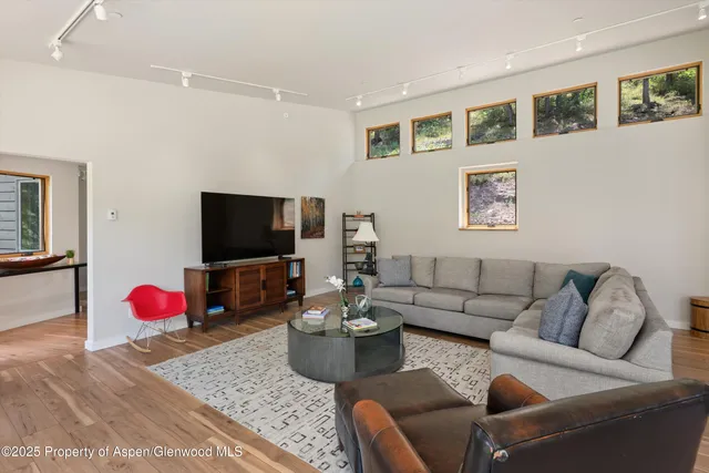 a view of a balcony with furniture