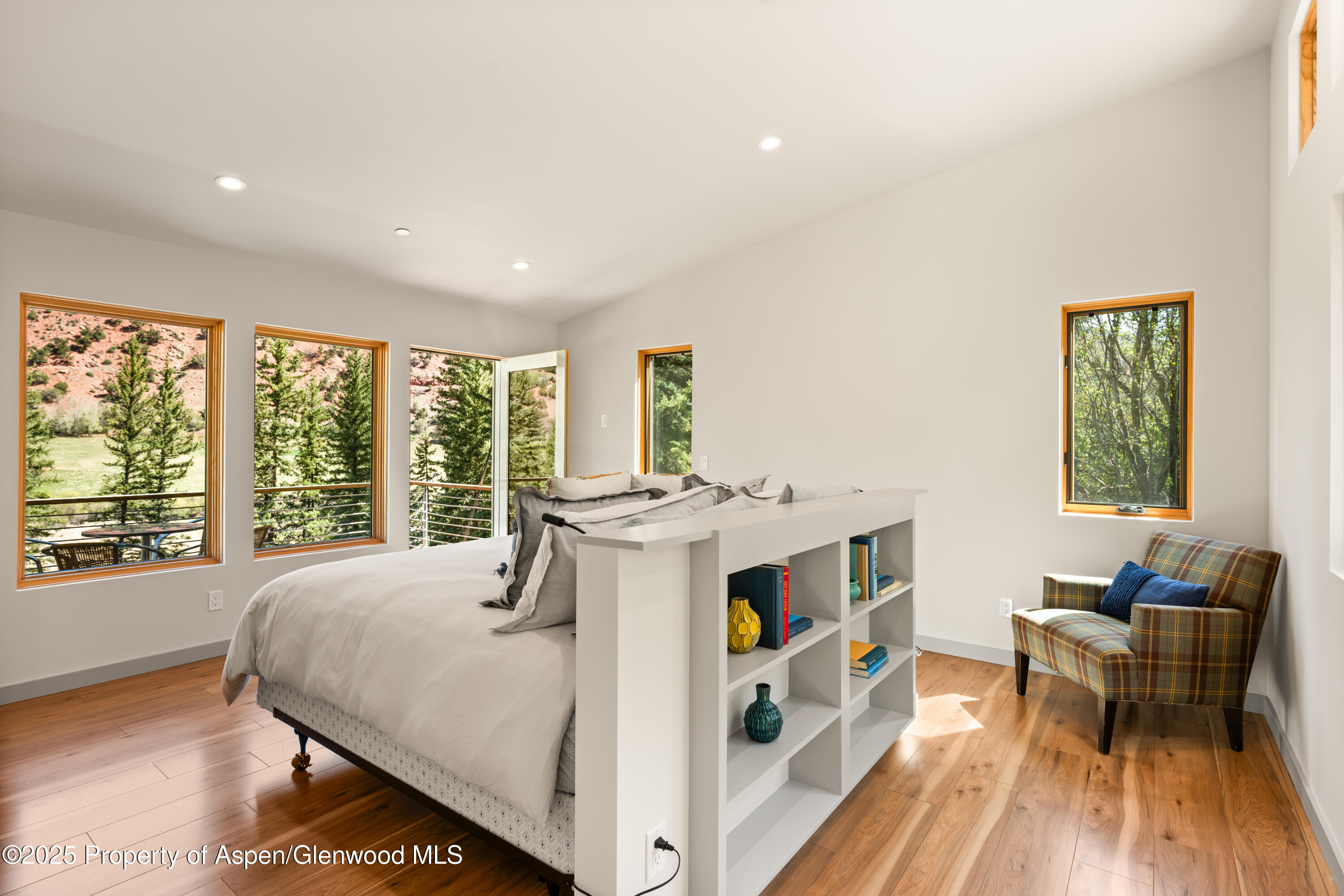 768 Kings Lake Road Basalt, CO 81621 - Photo 13 of 42 a bed room with a bed and a chair