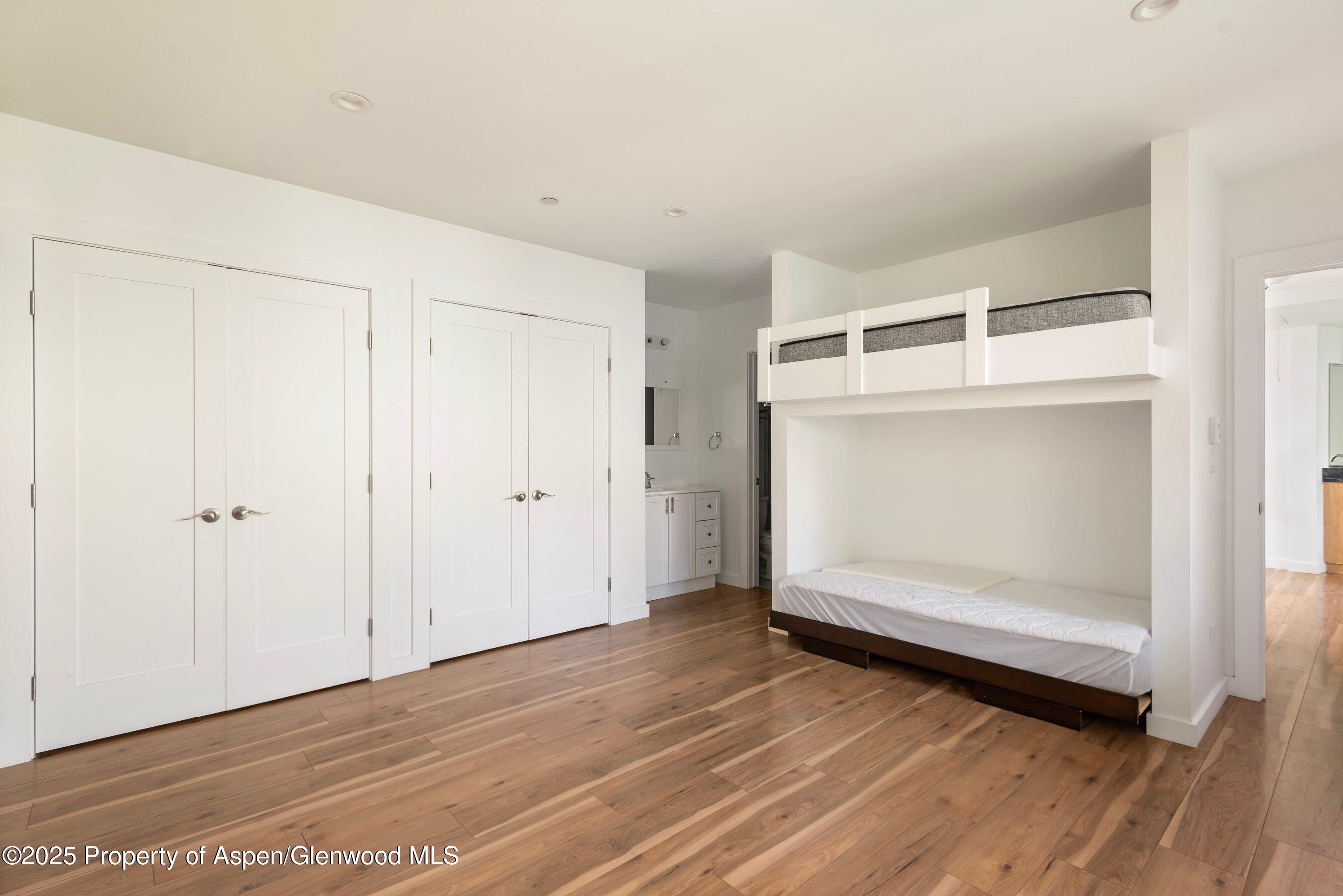 768 Kings Lake Road Basalt, CO 81621 - Photo 24 of 42 a view of empty room with wooden floor and fan