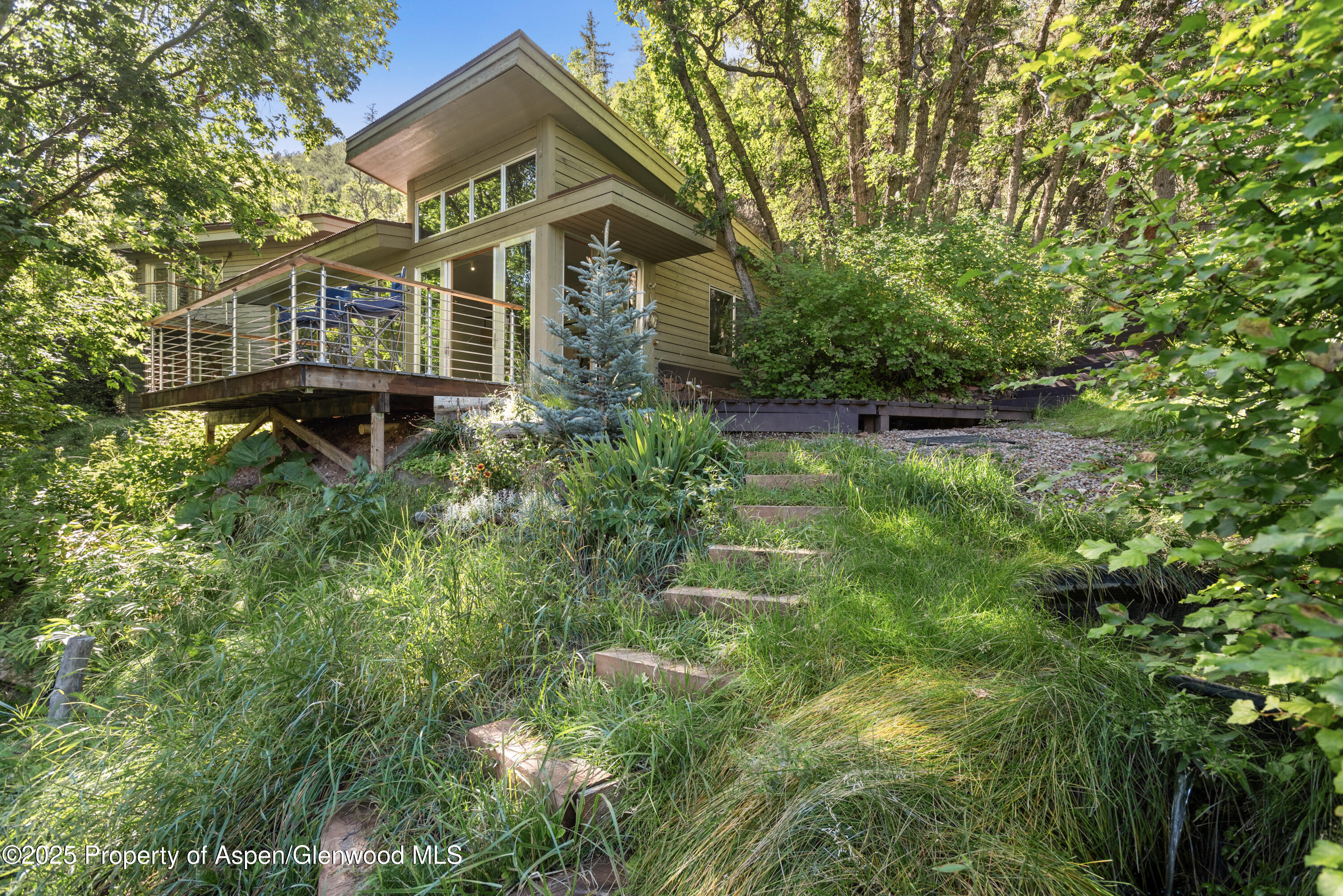 768 Kings Lake Road Basalt, CO 81621 - Photo 25 of 42 a aerial view of a house with pool and garden