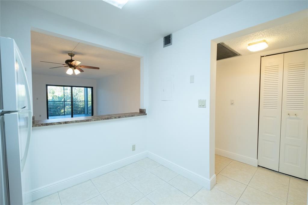 9233 Southwest 8th Street, Unit 222 Boca Raton, FL 33428 - Photo 4 of 29 a view of an empty room with a window