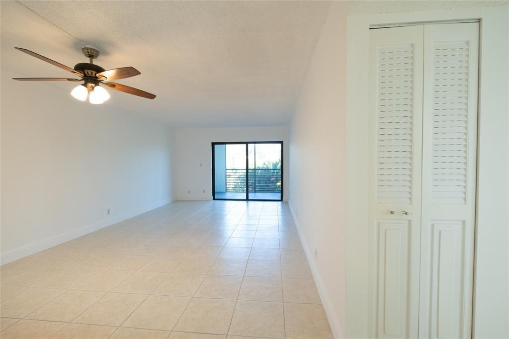 9233 Southwest 8th Street, Unit 222 Boca Raton, FL 33428 - Photo 5 of 29 a view of empty room with window