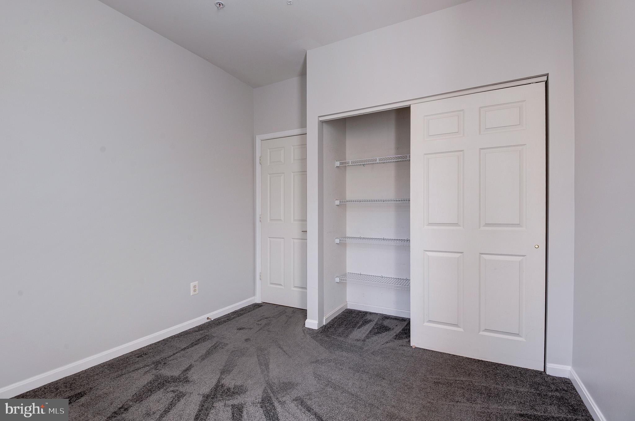 11407 Gate Hill Place, Unit 112 Reston, VA 20194 - Photo 17 of 28 a view of an empty room