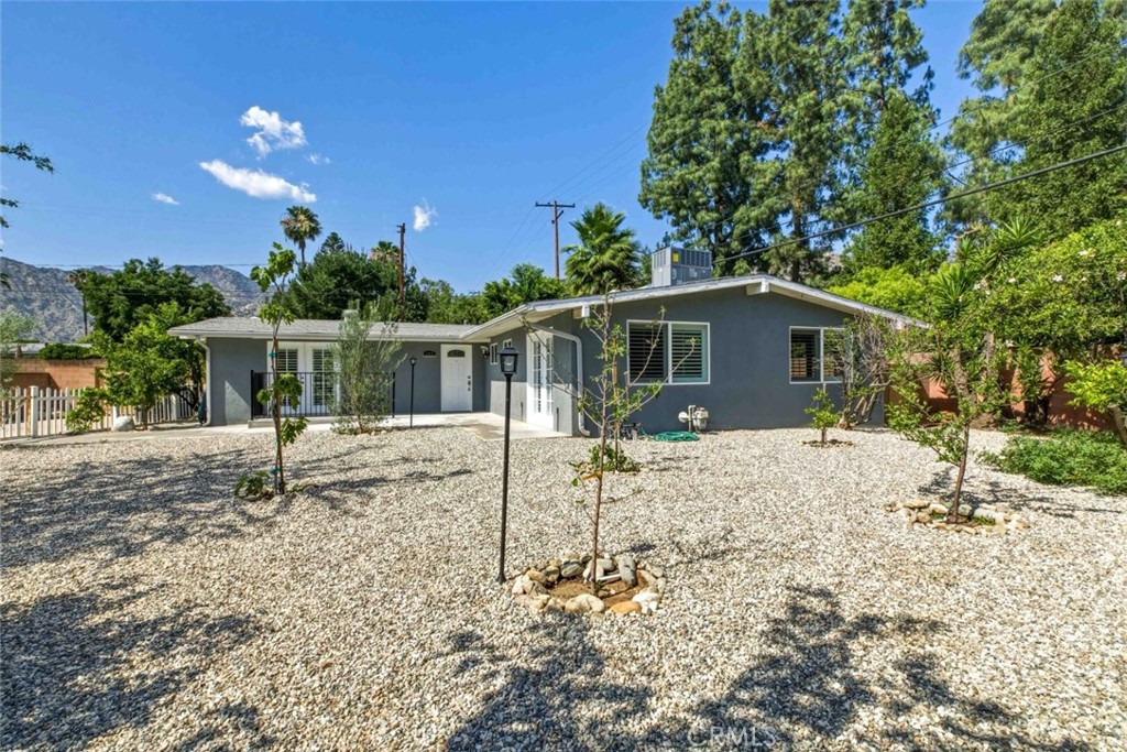 301 West Ashby Street Azusa, CA 91702 - Photo 43 of 75 a house view with a backyard space