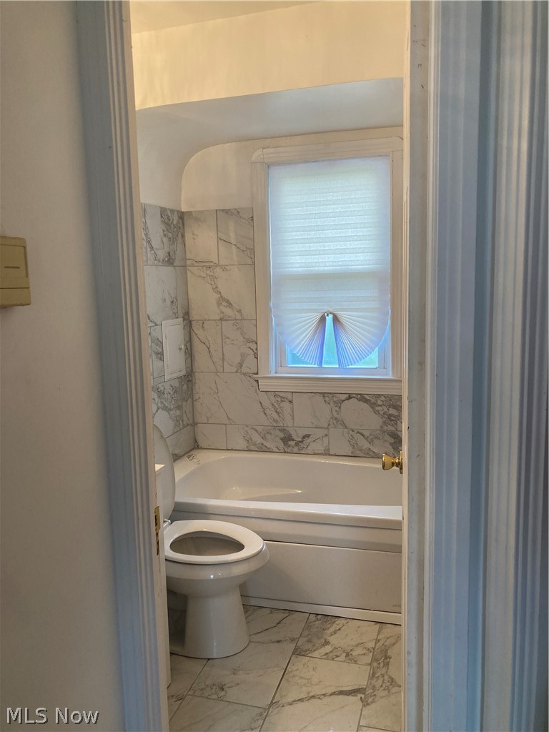 3800 Strandhill Road Cleveland, OH 44128 - Photo 6 of 34 Bathroom with toilet and tile patterned floors