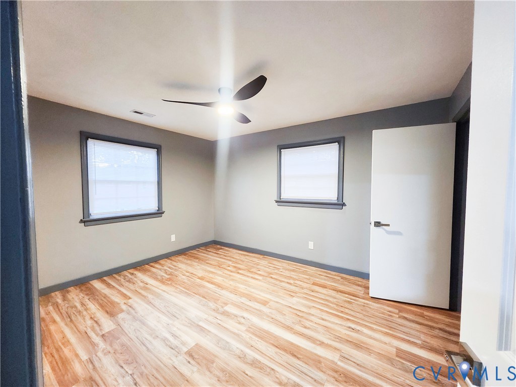 4060 Norborne Road Richmond, VA 23234 - Photo 14 of 24 Third bedroom featuring light wood-style flooring