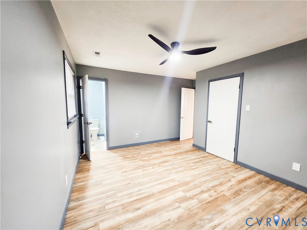 4060 Norborne Road Richmond, VA 23234 - Photo 17 of 24 Second Primary bedroom with fan light wood-style f