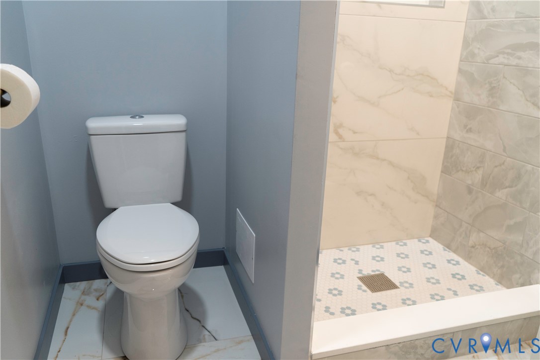 4060 Norborne Road Richmond, VA 23234 - Photo 19 of 24 Second primary bedroom bathroom featuring a stall