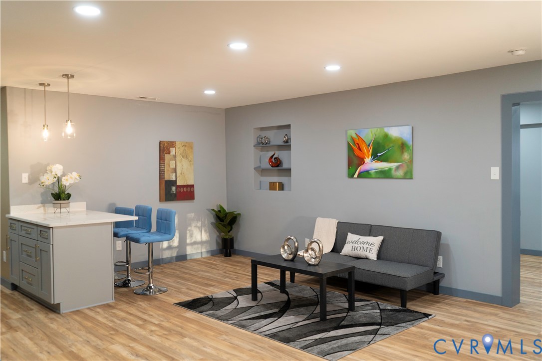 4060 Norborne Road Richmond, VA 23234 - Photo 2 of 24 Living room with light wood finished floors, reces