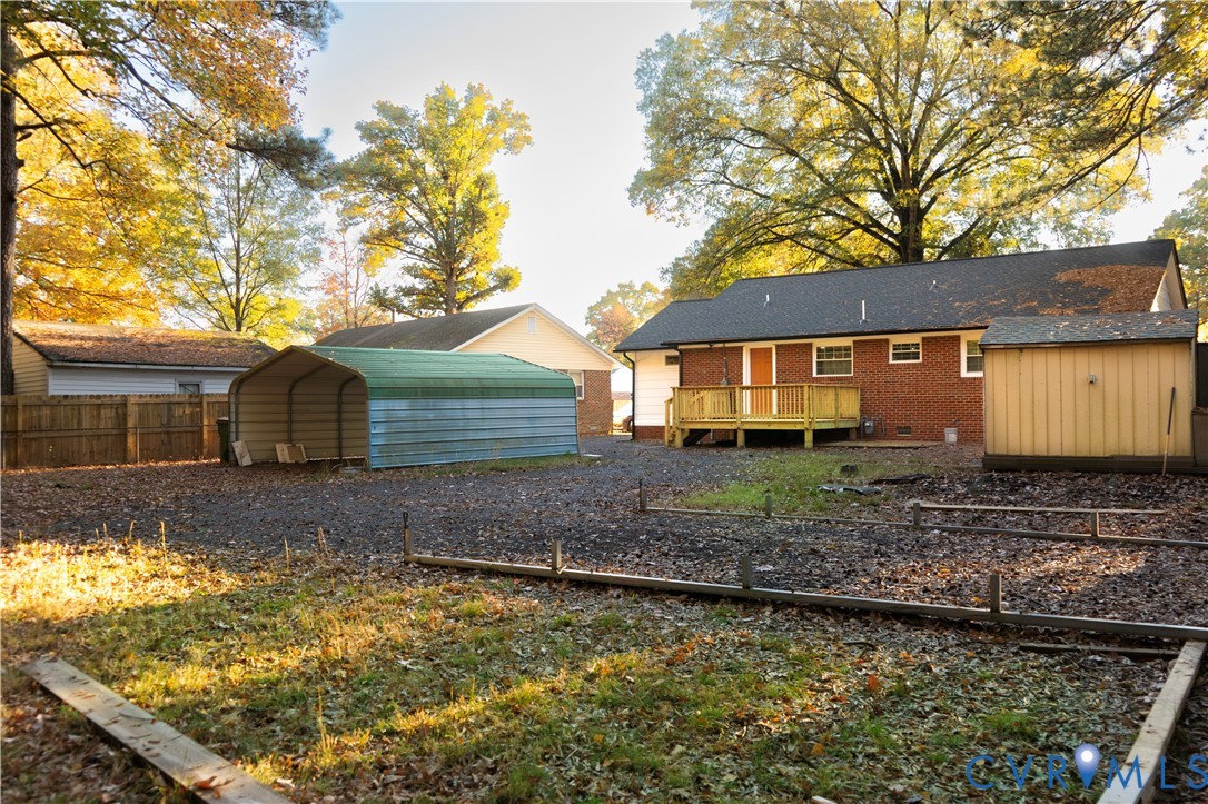 4060 Norborne Road Richmond, VA 23234 - Photo 24 of 24 Rear view of property with a carport, brick siding