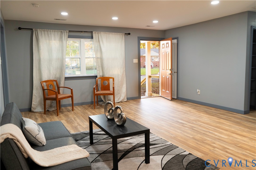 4060 Norborne Road Richmond, VA 23234 - Photo 3 of 24 Living area featuring light wood-style flooring an
