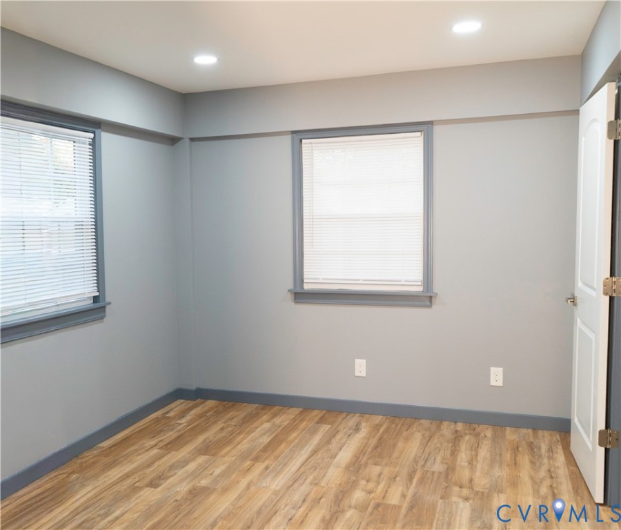 4060 Norborne Road Richmond, VA 23234 - Photo 10 of 24 Unfurnished room with light wood-style floors, ple