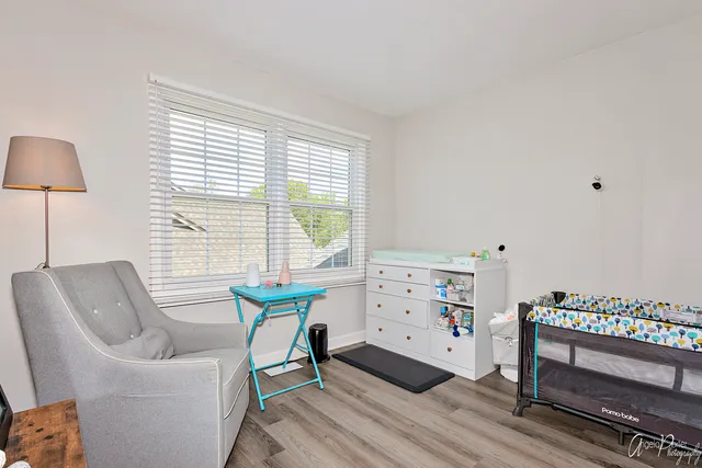 a room with furniture and a window