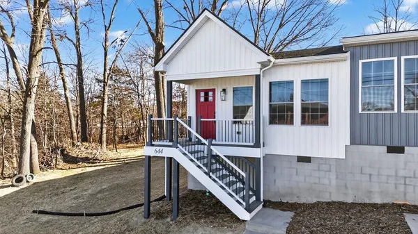 a view of house with a outdoor space