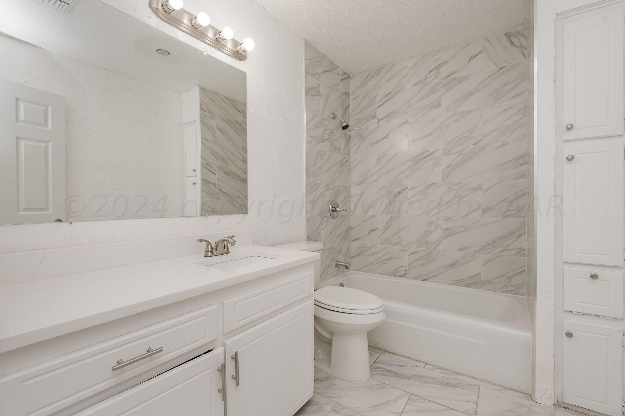 5108 Temple Drive Amarillo, TX 79110 - Photo 11 of 19 Hall Bathroom