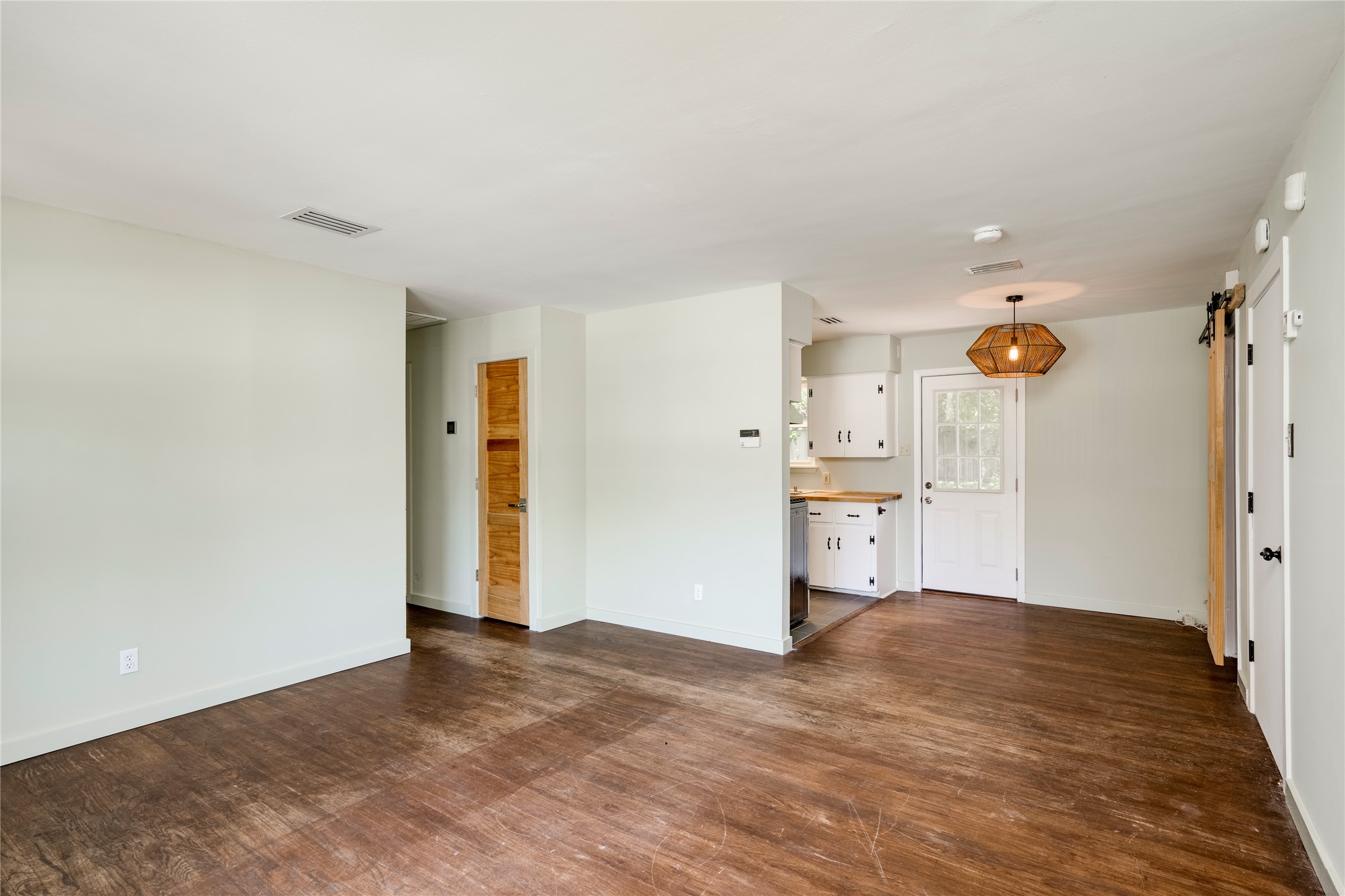 1707 Overhill Drive Austin, TX 78721 - Photo 6 of 36 Discover durable flooring and an open-concept layout, perfect for modern living.