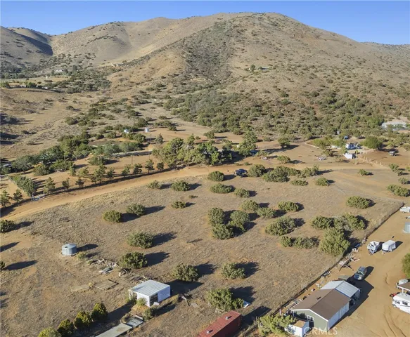 an aerial view of mountain with beach