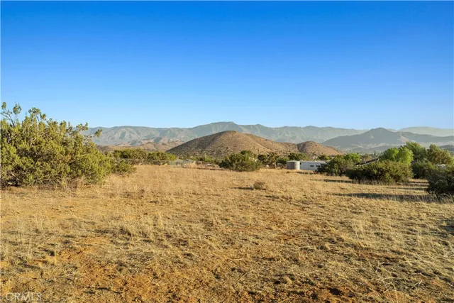 a view of lake with mountain