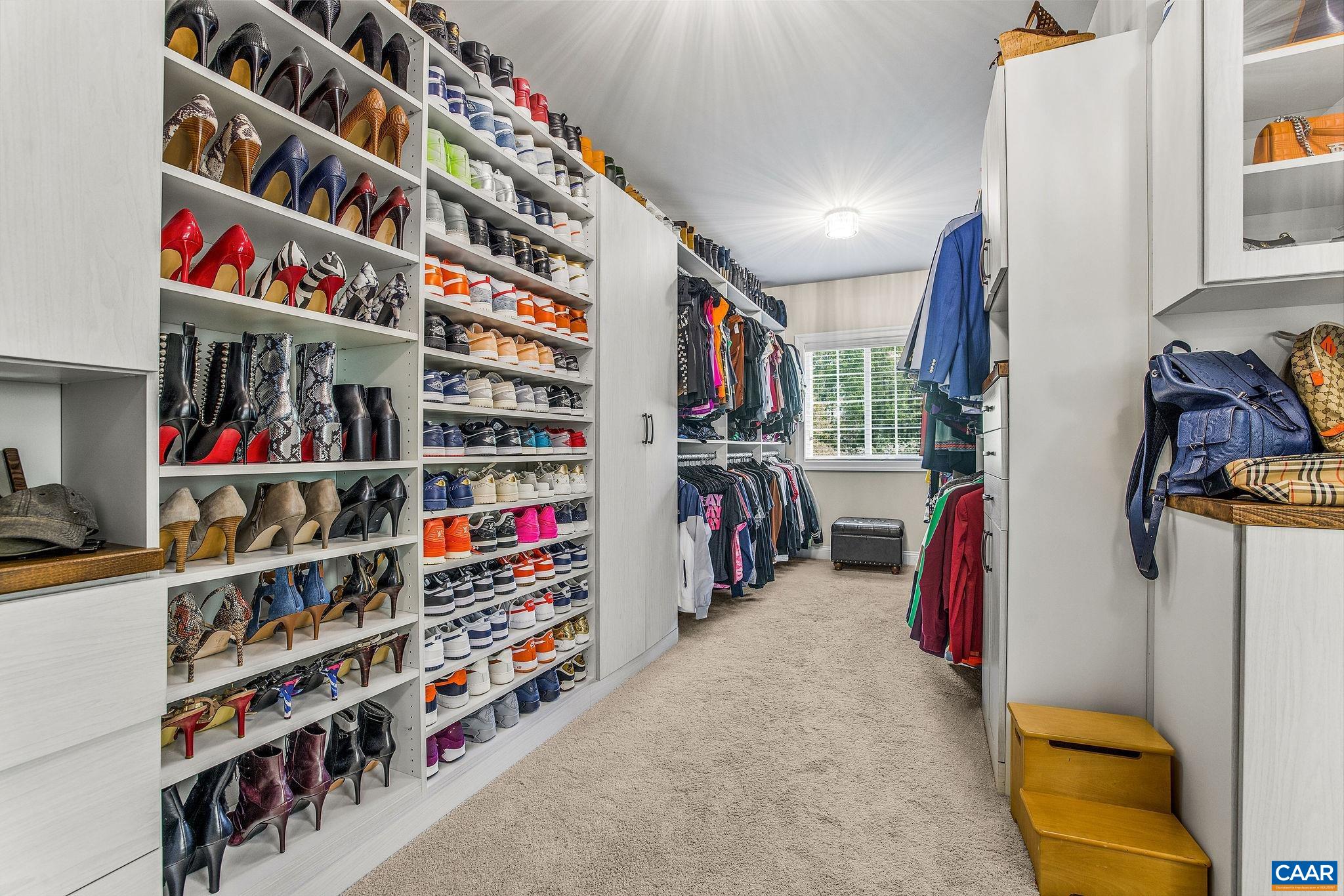 1630 Victor Place Charlottesville, VA 22903 - Photo 39 of 73 a view of walk in closet with clothes and shoes