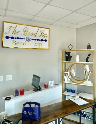 a bedroom with a bed and a table in it