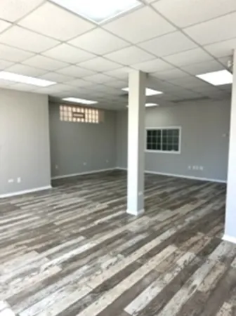 a view of a room with an empty space