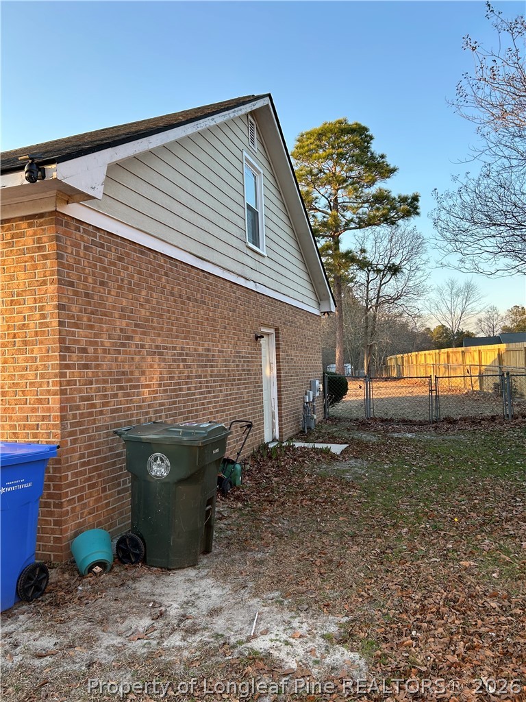 6520 Bagdad Road Fayetteville, NC 28306 - Photo 5 of 6 a view of a backyard