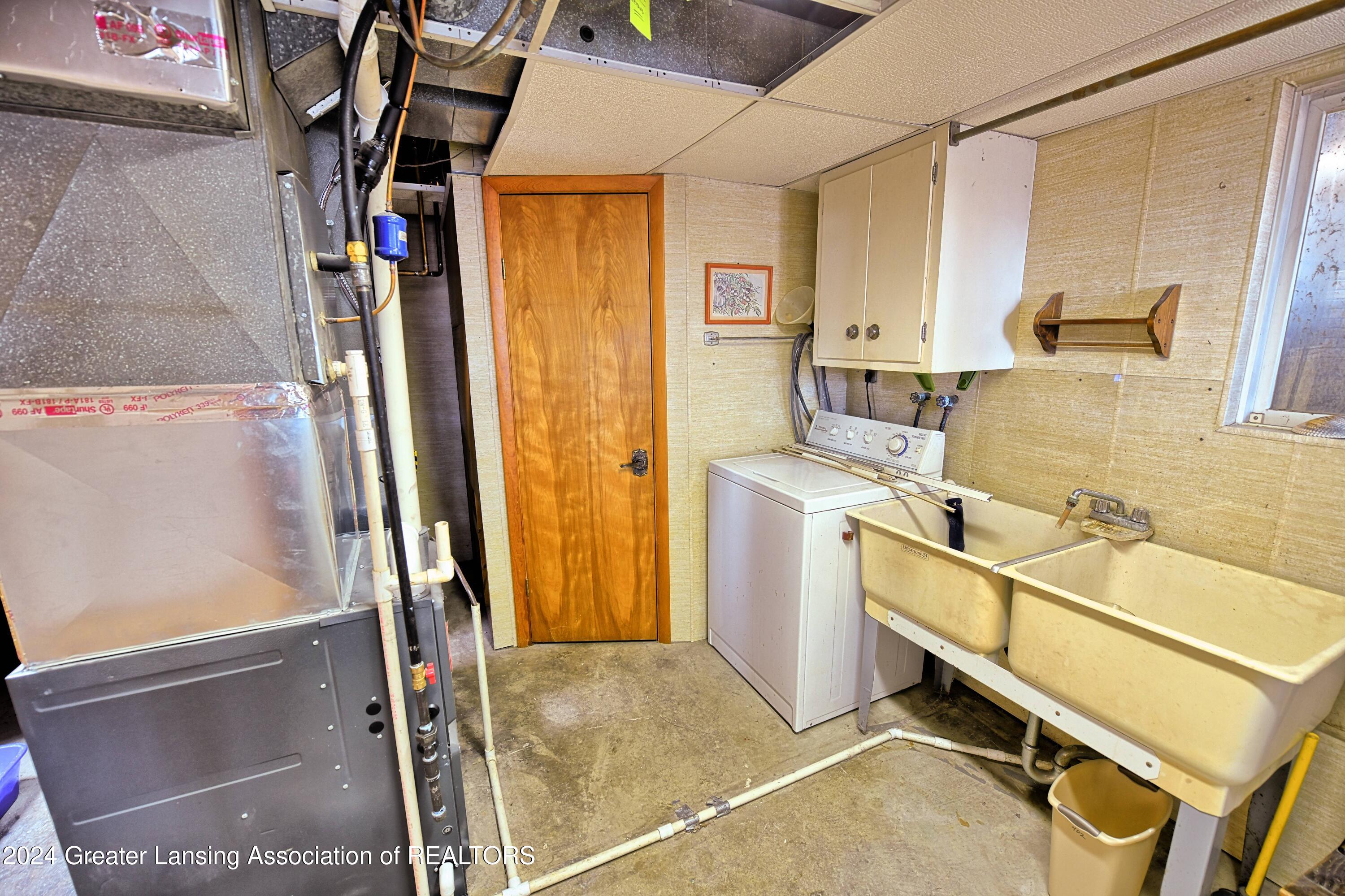 15027 West Cutler Road Portland, MI 48875 - Photo 25 of 65 Lower level laundry