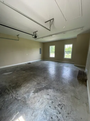 a view of a living room with a wooden floor