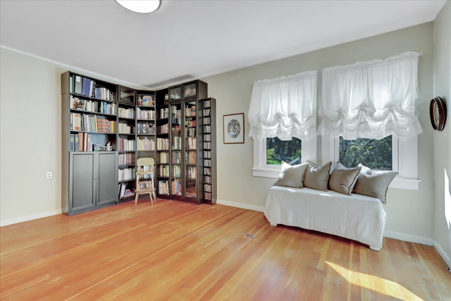 12562 Rough And Ready Highway Grass Valley, CA 95945 - Photo 36 of 99 a living room with furniture and a large window
