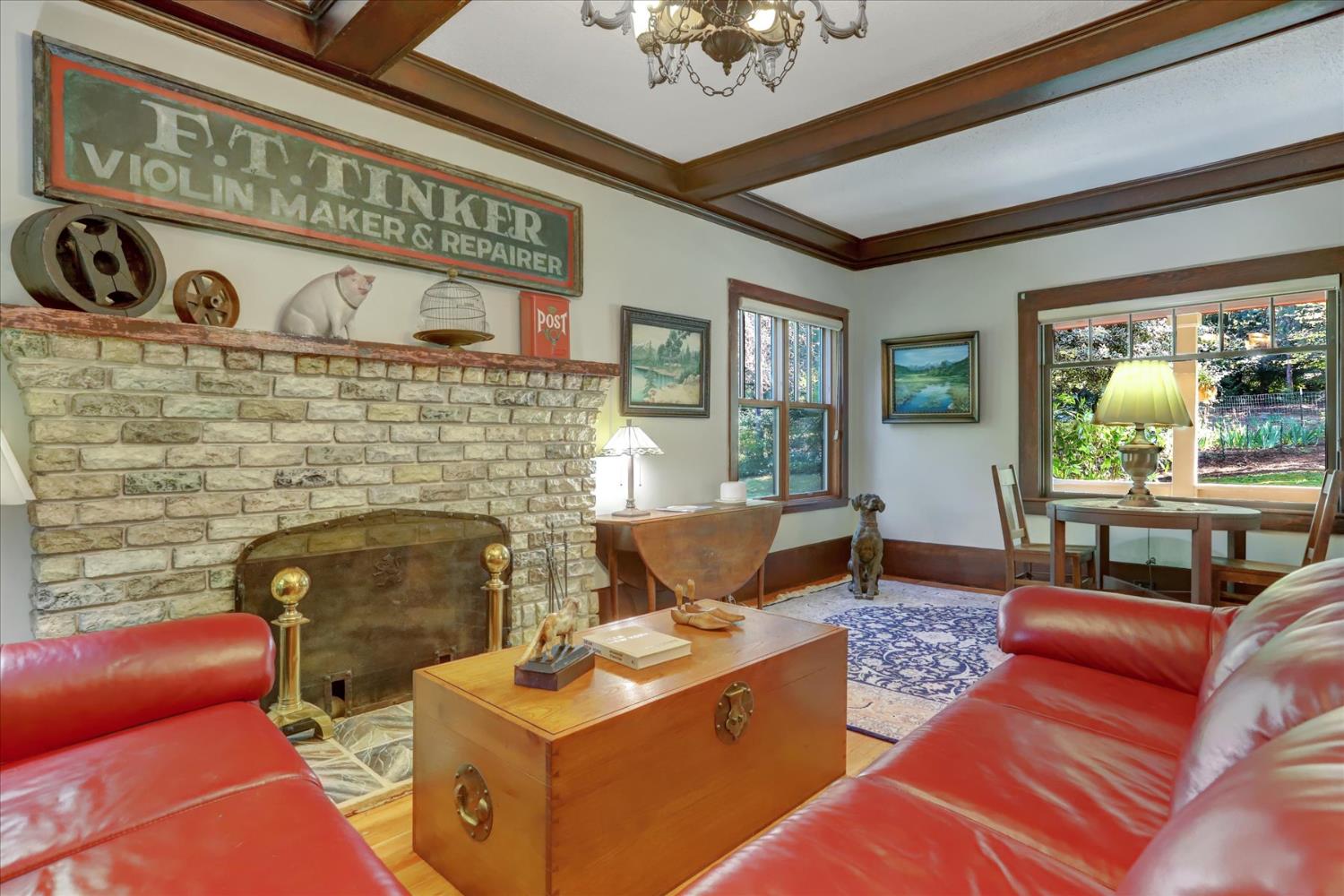 12562 Rough And Ready Highway Grass Valley, CA 95945 - Photo 6 of 99 a living room with furniture and a fireplace