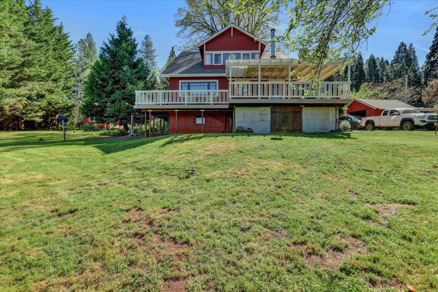 12562 Rough And Ready Highway Grass Valley, CA 95945 - Photo 66 of 99 a view of a house with a yard balcony and sitting area