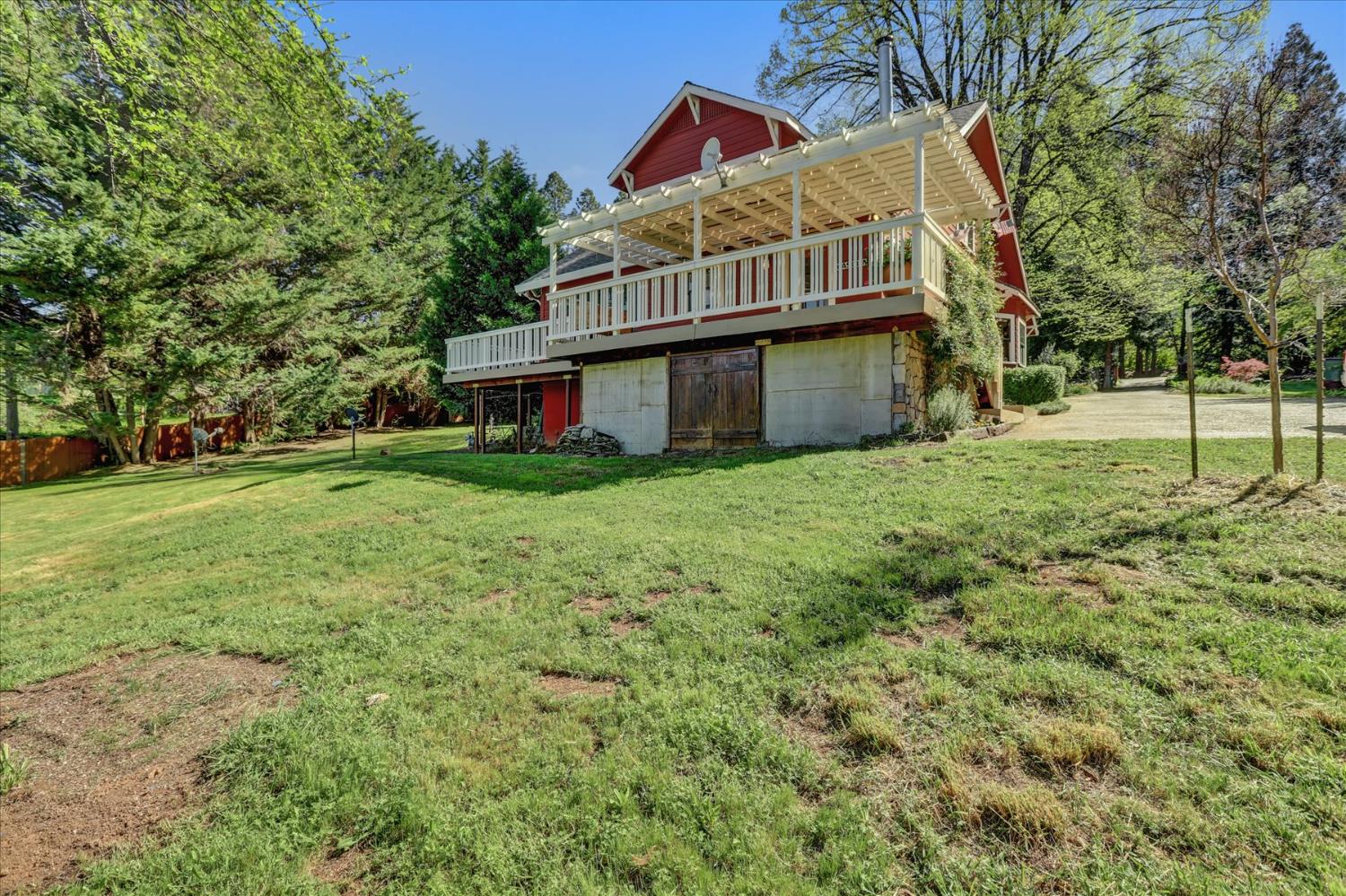 12562 Rough And Ready Highway Grass Valley, CA 95945 - Photo 68 of 99 a view of a house with a yard