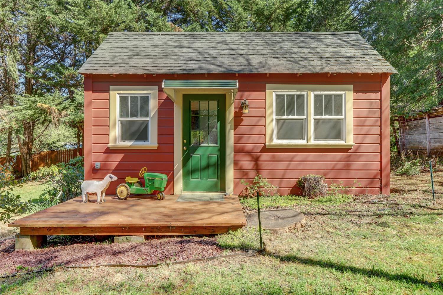 12562 Rough And Ready Highway Grass Valley, CA 95945 - Photo 73 of 99 a front view of a house with garden
